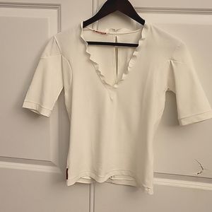 White Prada Tee in Size Small. Made in Italy. Gently worn.